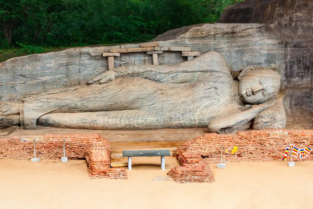 Reclining Buddha carved from granite at Gal Vihara in the ancient city of Polonnaruwa, Sri Lanka