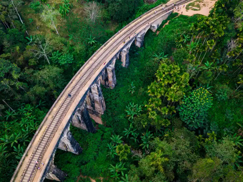Aerial view of the Nine Arch Bridge in Ella surrounded by jungle, on the Sri Lanka Legendary Trails and Coasts tour