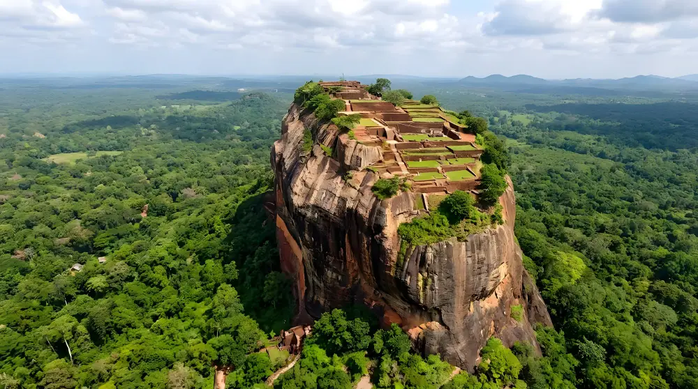 Sigiriya Lion Rock fortress rising above the forest, a highlight of the Best of Sri Lanka tour
