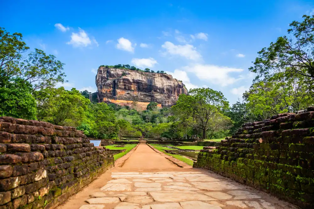 Sigiriya Lion Rock seen from the ancient water gardens path, on the Sri Lanka Legendary Trails and Coasts tour