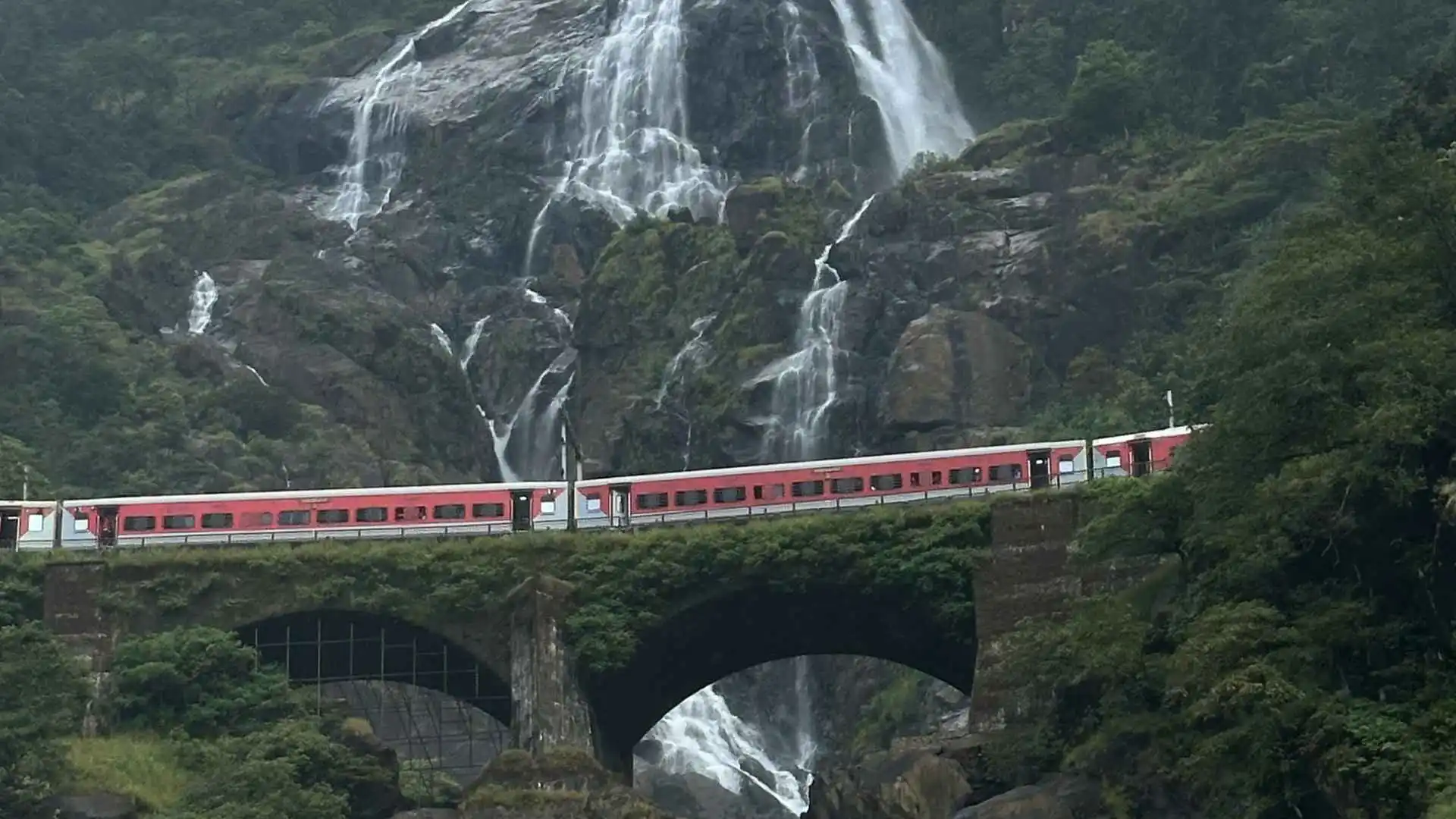 Train on Dudhsagar Dam